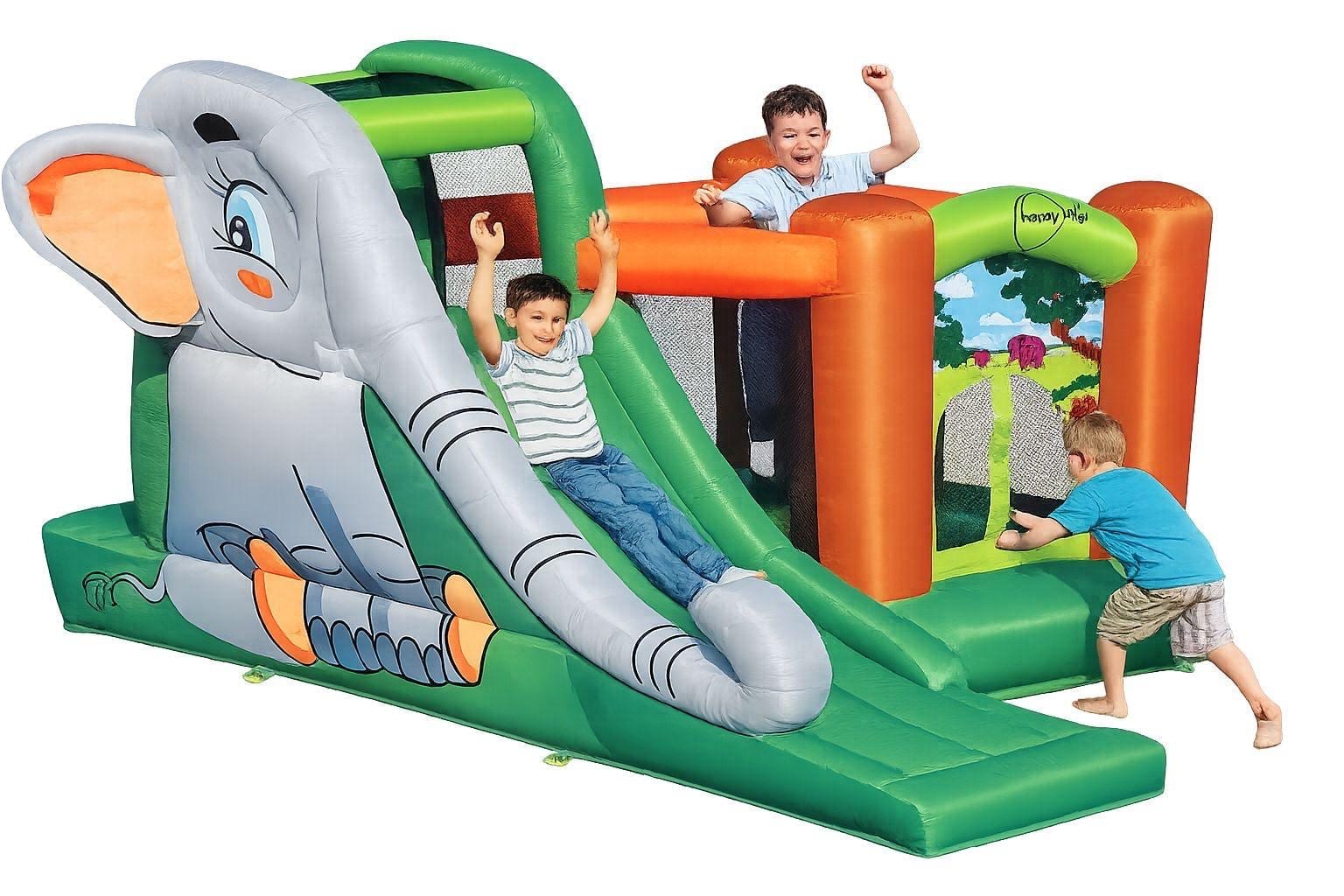 Château gonflable Éléphant avec toboggan, des enfants jouent dessus